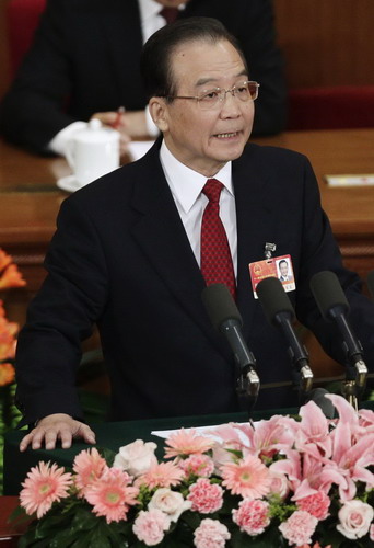 China unveils 5-year plan at co<em></em>ngress session