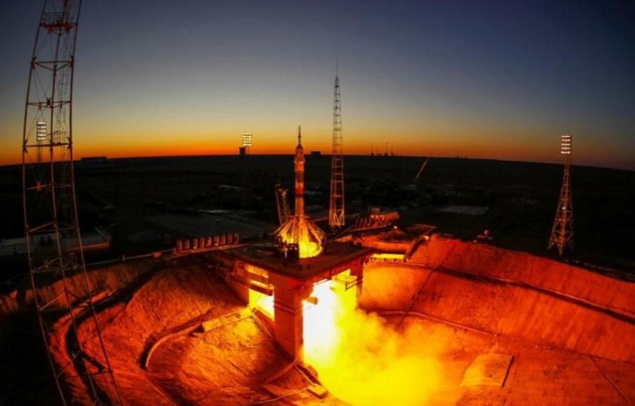 Three astro<em></em>nauts reach space station with Russian space caps